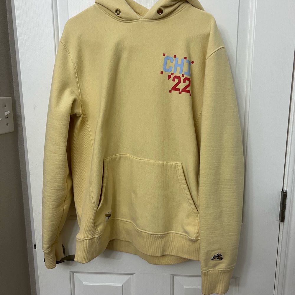 Tracksmith Yellow Hoodie with Red and Blue Accents